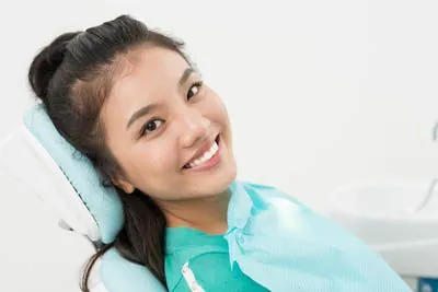 patient smiling after laser dentistry procedure at The Center for Progressive Dentistry